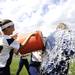 Saline players dump water on head coach Alicia Seegert after beating Allen Park on Saturday, June 8. Daniel Brenner I AnnArbor.com
